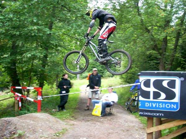 A biker takes to the air during the 2009 German downhill championship.